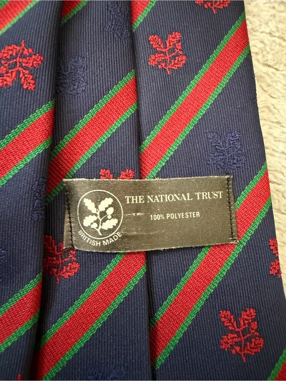 Navy Diagonal Stripe Tie with Red Crest Detail